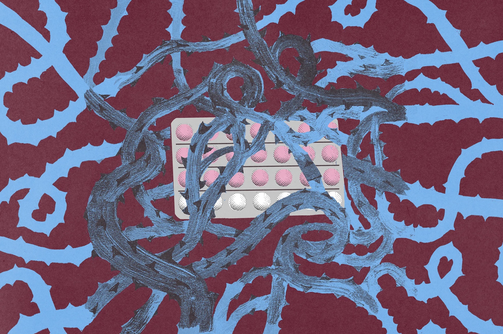 A sheet of birth control pills is surrounded by thorns